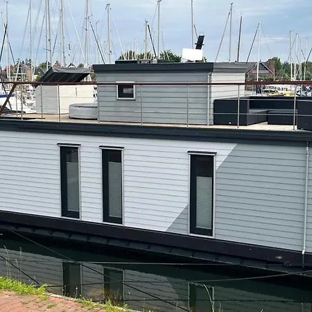 Hausboot Sundowner - Huus & Botel Grossenbrode